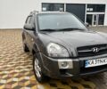 Серый Хендай Туксон, объемом двигателя 1.98 л и пробегом 254 тыс. км за 6900 $, фото 2 на Automoto.ua