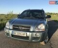 Серый Хендай Туксон, объемом двигателя 2 л и пробегом 230 тыс. км за 7780 $, фото 1 на Automoto.ua