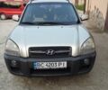 Сірий Хендай Туксон, об'ємом двигуна 1.98 л та пробігом 264 тис. км за 7600 $, фото 1 на Automoto.ua