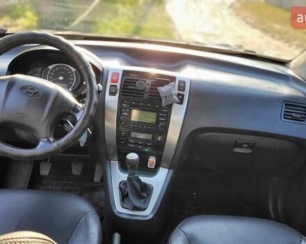 Серый Хендай Туксон, объемом двигателя 1.98 л и пробегом 190 тыс. км за 8500 $, фото 8 на Automoto.ua