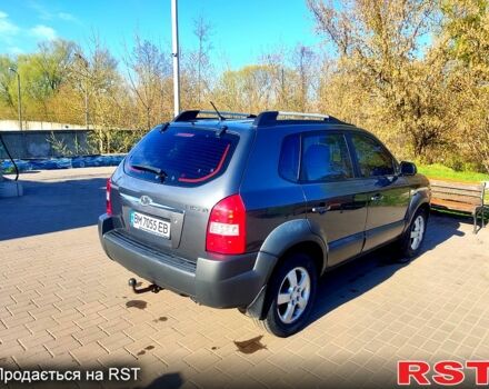 Серый Хендай Туксон, объемом двигателя 2 л и пробегом 210 тыс. км за 7200 $, фото 5 на Automoto.ua