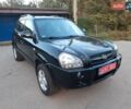 Серый Хендай Туксон, объемом двигателя 1.98 л и пробегом 206 тыс. км за 8600 $, фото 104 на Automoto.ua