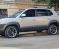 Серый Хендай Туксон, объемом двигателя 2.7 л и пробегом 209 тыс. км за 8800 $, фото 1 на Automoto.ua