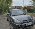 Серый Хендай Туксон, объемом двигателя 1.98 л и пробегом 271 тыс. км за 7600 $, фото 1 на Automoto.ua