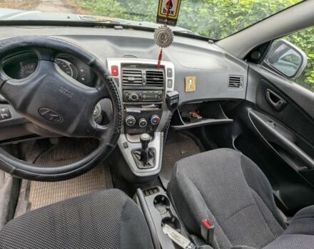 Серый Хендай Туксон, объемом двигателя 2 л и пробегом 220 тыс. км за 2000 $, фото 9 на Automoto.ua