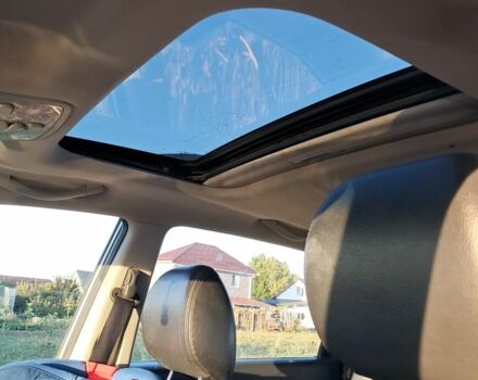 Серый Хендай Туксон, объемом двигателя 2.7 л и пробегом 244 тыс. км за 7200 $, фото 7 на Automoto.ua