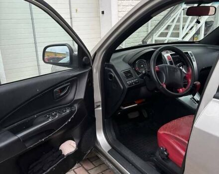 Серый Хендай Туксон, объемом двигателя 2 л и пробегом 330 тыс. км за 6200 $, фото 4 на Automoto.ua