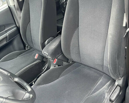 Сірий Хендай Туксон, об'ємом двигуна 2 л та пробігом 172 тис. км за 8550 $, фото 14 на Automoto.ua