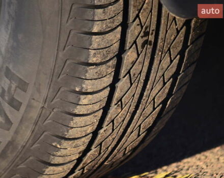 Серый Хендай Туксон, объемом двигателя 2 л и пробегом 271 тыс. км за 8000 $, фото 9 на Automoto.ua