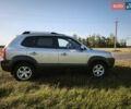 Серый Хендай Туксон, объемом двигателя 1.98 л и пробегом 119 тыс. км за 9988 $, фото 3 на Automoto.ua