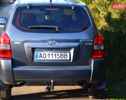 Серый Хендай Туксон, объемом двигателя 2 л и пробегом 271 тыс. км за 8000 $, фото 7 на Automoto.ua