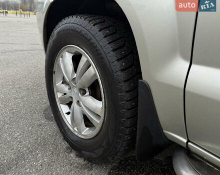 Серый Хендай Туксон, объемом двигателя 1.98 л и пробегом 307 тыс. км за 8700 $, фото 14 на Automoto.ua