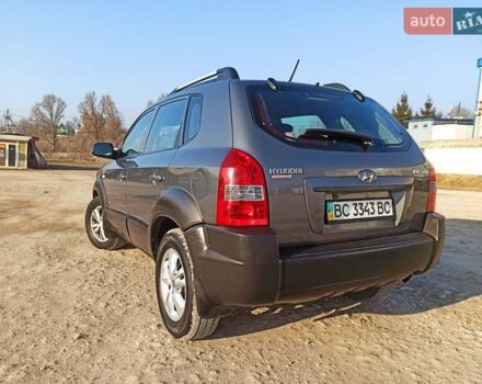 Серый Хендай Туксон, объемом двигателя 1.98 л и пробегом 250 тыс. км за 6999 $, фото 8 на Automoto.ua