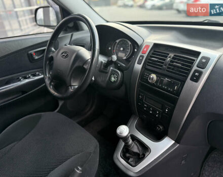 Серый Хендай Туксон, объемом двигателя 2 л и пробегом 202 тыс. км за 10000 $, фото 33 на Automoto.ua