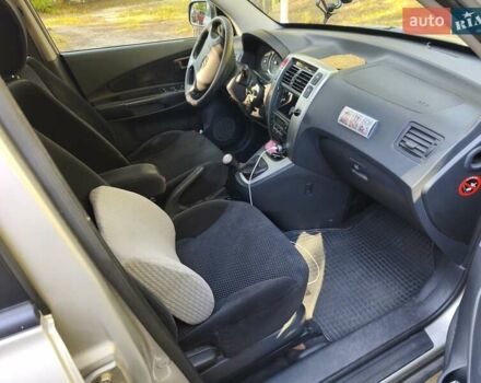 Серый Хендай Туксон, объемом двигателя 1.98 л и пробегом 119 тыс. км за 9988 $, фото 19 на Automoto.ua