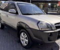 Серый Хендай Туксон, объемом двигателя 2 л и пробегом 162 тыс. км за 8900 $, фото 2 на Automoto.ua