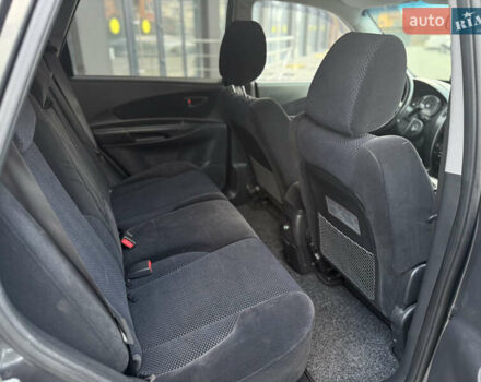 Серый Хендай Туксон, объемом двигателя 2 л и пробегом 202 тыс. км за 10000 $, фото 30 на Automoto.ua