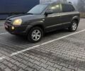 Сірий Хендай Туксон, об'ємом двигуна 1.98 л та пробігом 233 тис. км за 8699 $, фото 1 на Automoto.ua