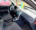 Серый Хендай Туксон, объемом двигателя 2 л и пробегом 235 тыс. км за 7800 $, фото 3 на Automoto.ua