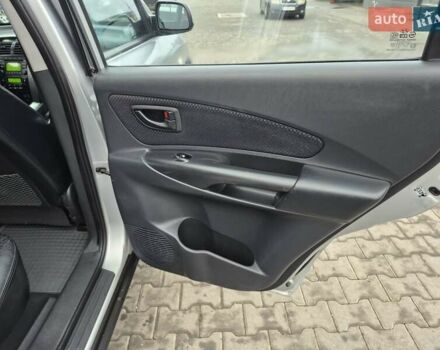 Серый Хендай Туксон, объемом двигателя 1.98 л и пробегом 189 тыс. км за 8300 $, фото 14 на Automoto.ua