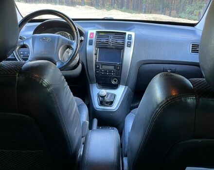 Серый Хендай Туксон, объемом двигателя 2 л и пробегом 130 тыс. км за 8700 $, фото 2 на Automoto.ua