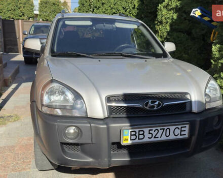 Серый Хендай Туксон, объемом двигателя 2 л и пробегом 162 тыс. км за 8900 $, фото 8 на Automoto.ua