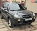 Серый Хендай Туксон, объемом двигателя 1.99 л и пробегом 209 тыс. км за 8499 $, фото 1 на Automoto.ua