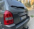Серый Хендай Туксон, объемом двигателя 2 л и пробегом 130 тыс. км за 9300 $, фото 2 на Automoto.ua