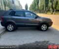 Серый Хендай Туксон, объемом двигателя 2 л и пробегом 130 тыс. км за 9300 $, фото 1 на Automoto.ua
