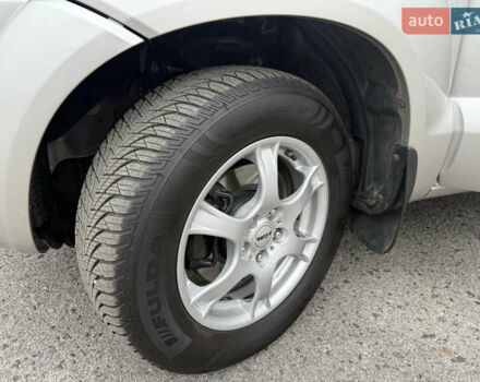 Серый Хендай Туксон, объемом двигателя 2 л и пробегом 195 тыс. км за 9950 $, фото 19 на Automoto.ua