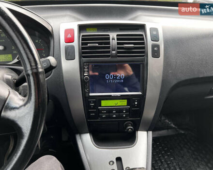 Серый Хендай Туксон, объемом двигателя 1.98 л и пробегом 274 тыс. км за 7700 $, фото 11 на Automoto.ua