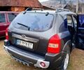 Серый Хендай Туксон, объемом двигателя 2 л и пробегом 235 тыс. км за 7800 $, фото 6 на Automoto.ua
