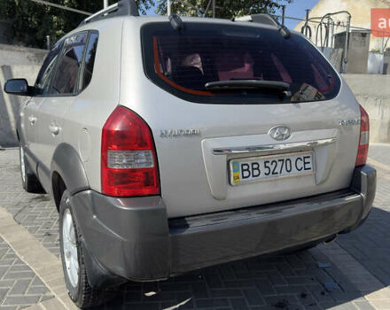 Серый Хендай Туксон, объемом двигателя 2 л и пробегом 162 тыс. км за 8900 $, фото 6 на Automoto.ua