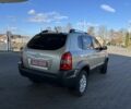 Сірий Хендай Туксон, об'ємом двигуна 2 л та пробігом 166 тис. км за 8950 $, фото 4 на Automoto.ua