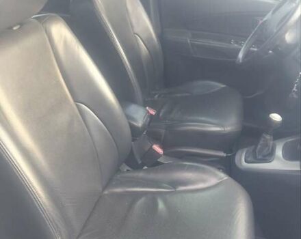 Сірий Хендай Туксон, об'ємом двигуна 1.98 л та пробігом 84 тис. км за 9200 $, фото 7 на Automoto.ua