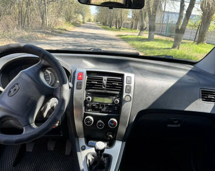 Сірий Хендай Туксон, об'ємом двигуна 1.98 л та пробігом 318 тис. км за 7400 $, фото 12 на Automoto.ua