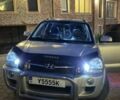 Серый Хендай Туксон, объемом двигателя 2 л и пробегом 280 тыс. км за 9800 $, фото 5 на Automoto.ua