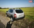 Серый Хендай Туксон, объемом двигателя 1.98 л и пробегом 119 тыс. км за 9988 $, фото 5 на Automoto.ua