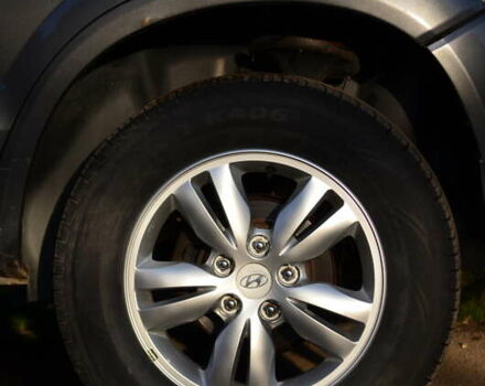 Серый Хендай Туксон, объемом двигателя 2 л и пробегом 271 тыс. км за 8000 $, фото 2 на Automoto.ua