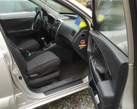 Серый Хендай Туксон, объемом двигателя 2 л и пробегом 228 тыс. км за 8200 $, фото 4 на Automoto.ua