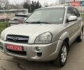 Серый Хендай Туксон, объемом двигателя 2 л и пробегом 158 тыс. км за 9600 $, фото 1 на Automoto.ua