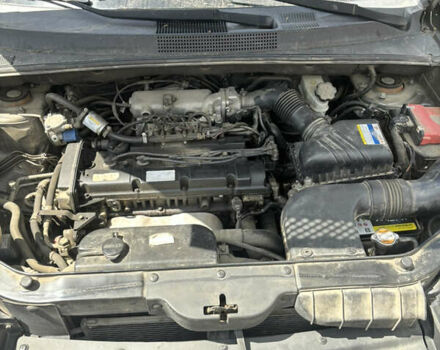 Сірий Хендай Туксон, об'ємом двигуна 1.98 л та пробігом 250 тис. км за 5400 $, фото 7 на Automoto.ua