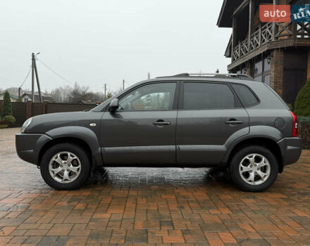 Серый Хендай Туксон, объемом двигателя 2 л и пробегом 86 тыс. км за 9800 $, фото 6 на Automoto.ua