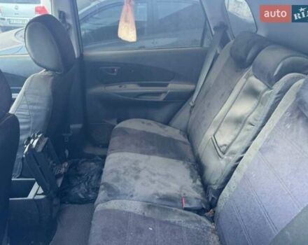 Серый Хендай Туксон, объемом двигателя 1.98 л и пробегом 100 тыс. км за 1947 $, фото 3 на Automoto.ua