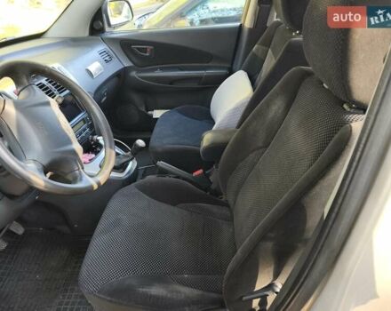 Серый Хендай Туксон, объемом двигателя 1.98 л и пробегом 119 тыс. км за 9988 $, фото 18 на Automoto.ua