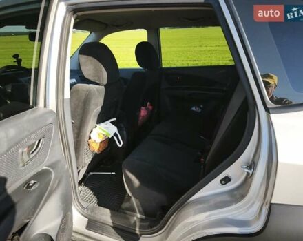 Серый Хендай Туксон, объемом двигателя 1.98 л и пробегом 119 тыс. км за 9988 $, фото 8 на Automoto.ua