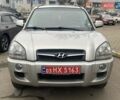 Серый Хендай Туксон, объемом двигателя 2 л и пробегом 158 тыс. км за 9600 $, фото 1 на Automoto.ua