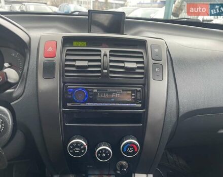 Серый Хендай Туксон, объемом двигателя 2 л и пробегом 158 тыс. км за 9600 $, фото 15 на Automoto.ua