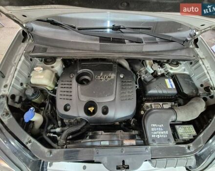 Сірий Хендай Туксон, об'ємом двигуна 2 л та пробігом 284 тис. км за 9200 $, фото 10 на Automoto.ua