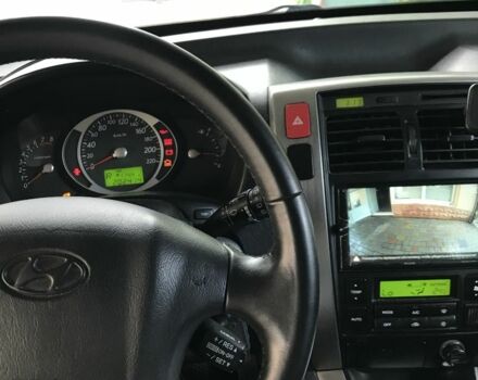 Серый Хендай Туксон, объемом двигателя 2.7 л и пробегом 215 тыс. км за 7900 $, фото 4 на Automoto.ua